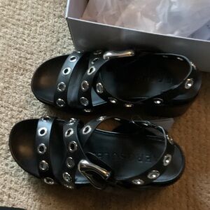 AEROSOLES Black Sandals with Metallic Accents